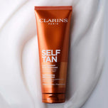 CLARINS-Leite autobronzeador para rosto e corpo 125 ml.-DrShampoo - Perfumaria e Cosmética